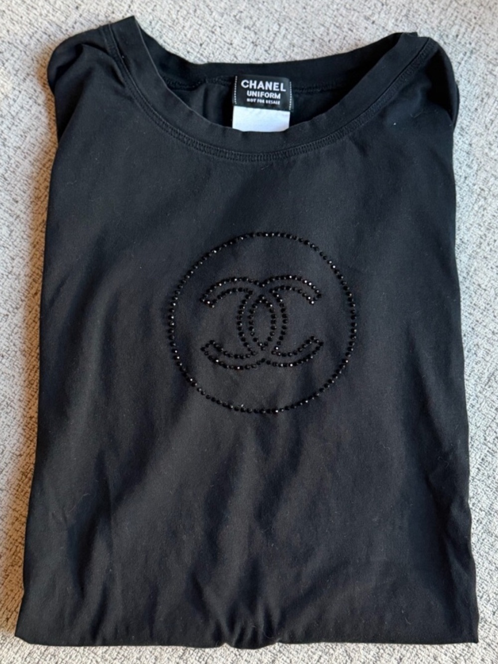 CHANEL Black Short Sleeve Top with Beaded CC Emblem